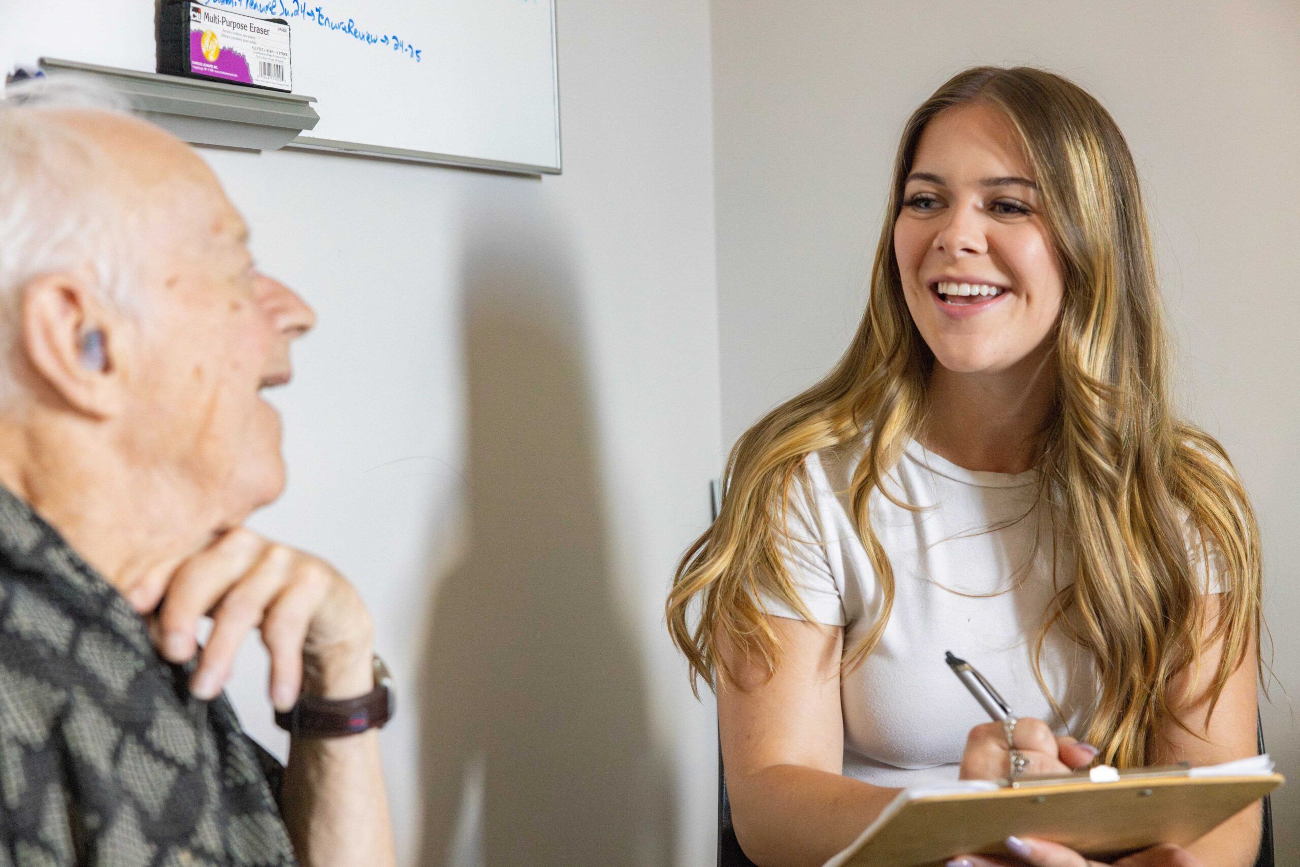 An NAU Psychology student works with a patient at the Healthy Aging Lab.
