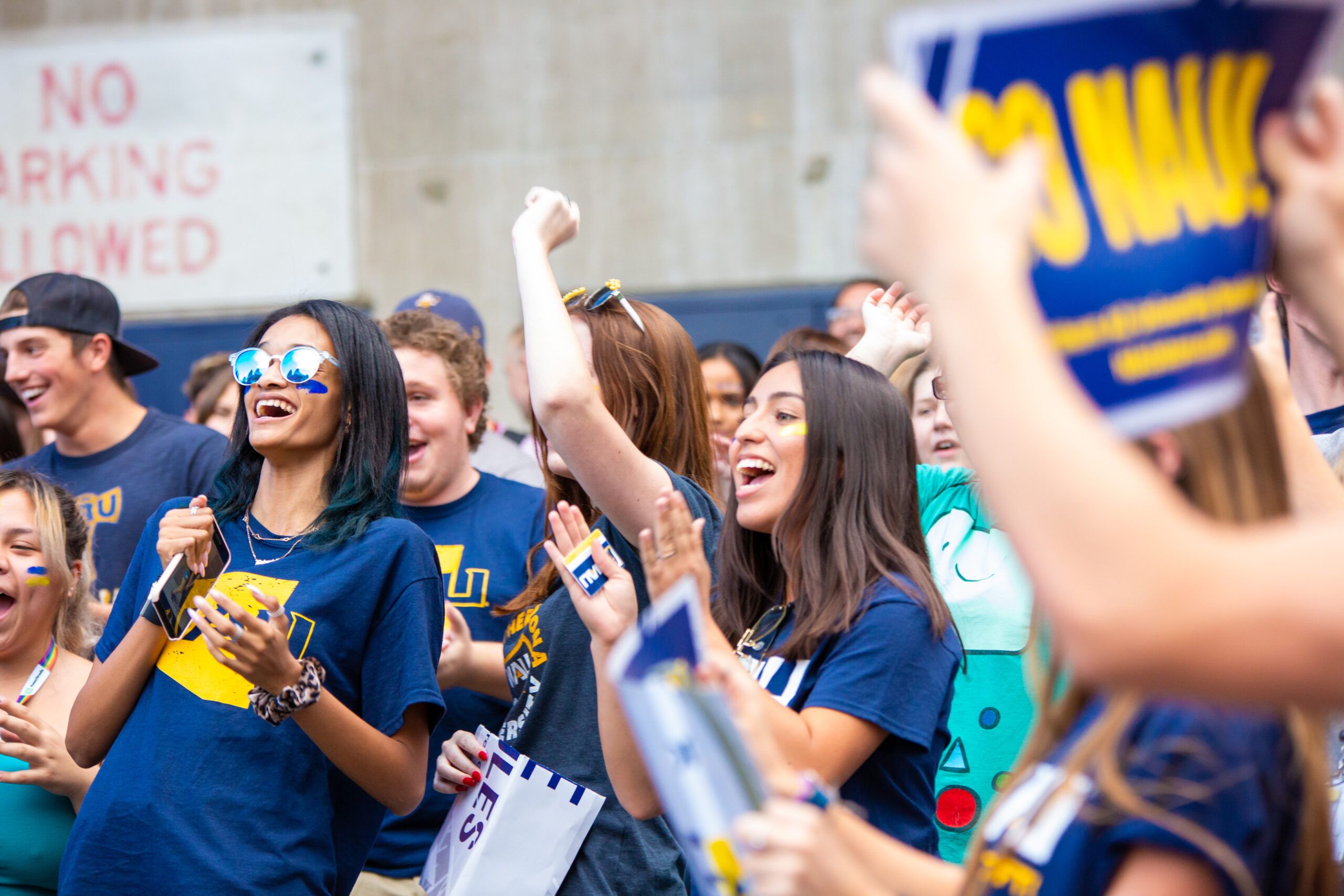 Students cheering at welcome week.