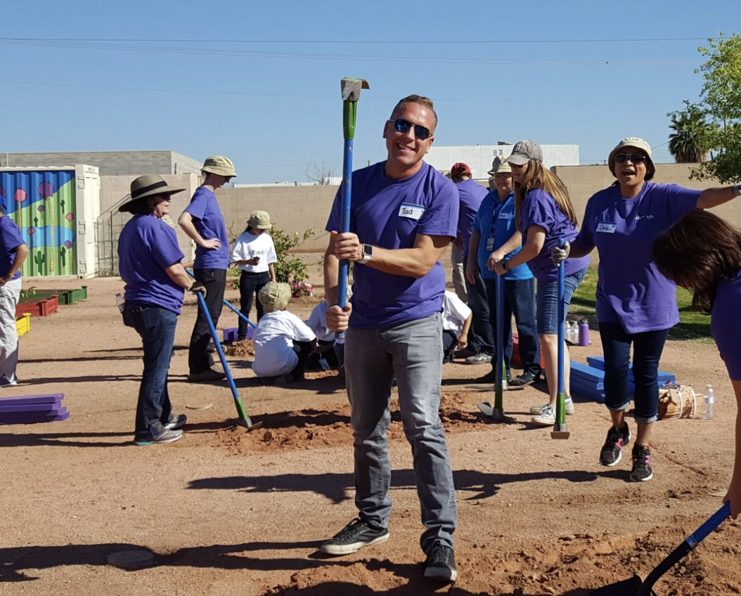 NAU alumnus Tad Gary volunteers at a park.