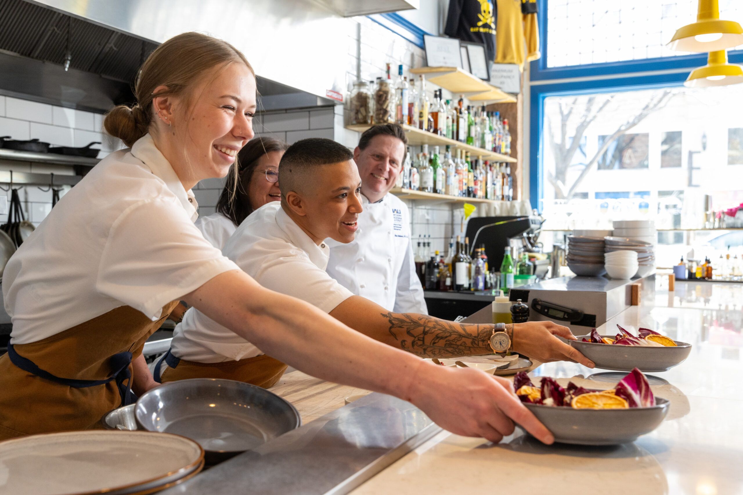 HRM staff, students, and faculty get hands-on experience serving dishes at Shift, a local Flagstaff restaurant.